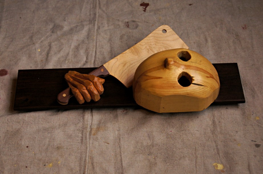 head and knife - side